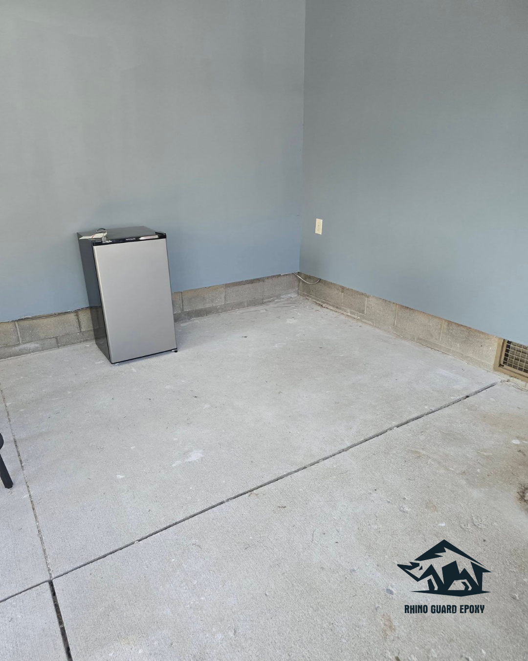 Garage concrete surface in Bellefontaine OH before epoxy flooring preparation.